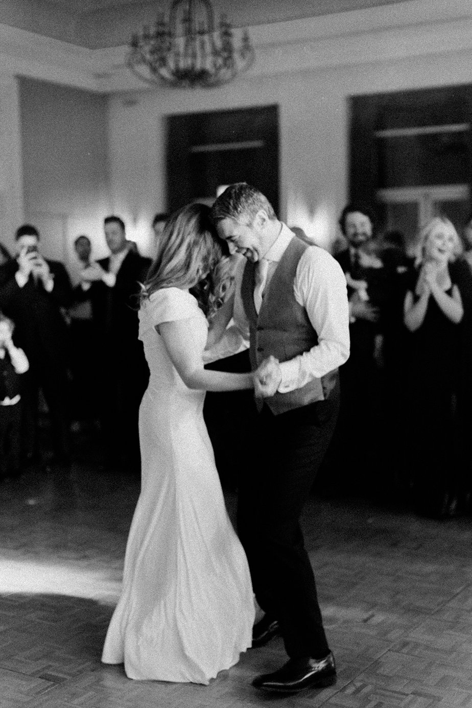 Bride and groom dance dancefloor smiling smile black and white